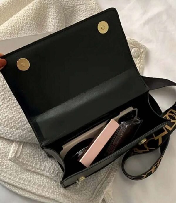 Imagen de WhatsApp 2025-10-21 a las 12.44.37_3ae345c3 Cartera premium diseño cruzado elegante