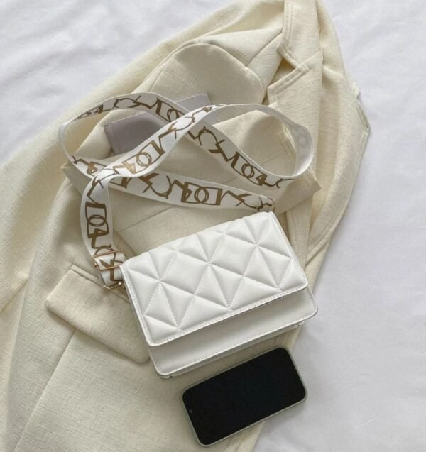 Imagen de WhatsApp 2025-10-21 a las 12.45.54_1112100b Cartera premium diseño cruzado elegante