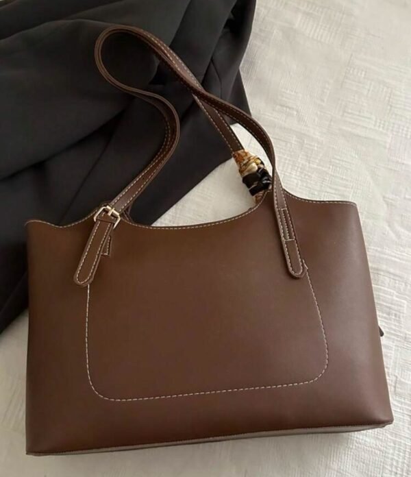 Cartera eco cuero marrón integral impermeable