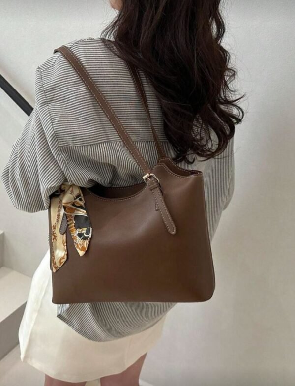 Cartera eco cuero marrón integral impermeable