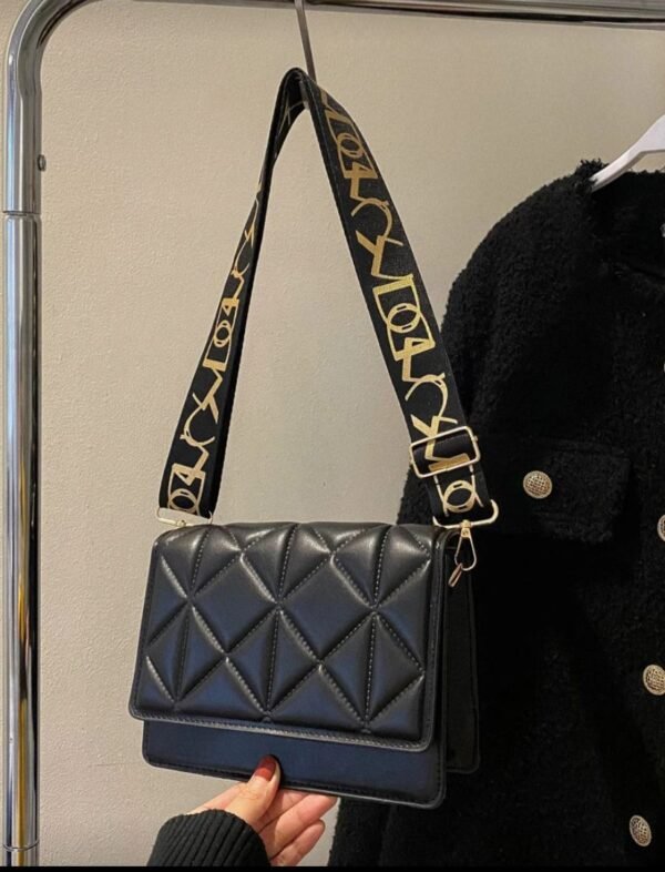 Imagen de WhatsApp 2025-11-07 a las 22.31.12_a18c78a8 Cartera premium diseño cruzado elegante